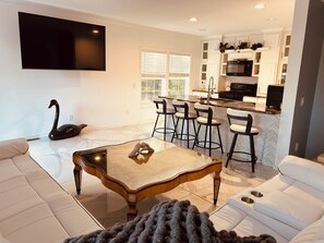 Athena House | Living area | 75-inch Smart TV with digital channels, Netflix, first-run movies