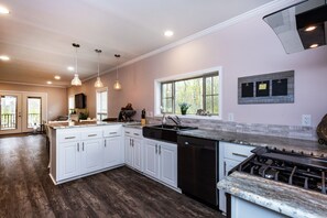Sanctuary House | Private kitchen | Full-size fridge, microwave, oven, stovetop