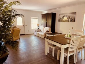 Haven House | Living area | 75-inch Smart TV with digital channels, Netflix, first-run movies - Swan Lake Resort Rentals (Absecon)