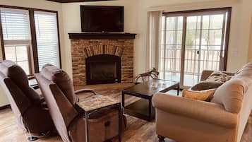 Paradise House | Living area | 75-inch Smart TV with digital channels, Netflix, first-run movies