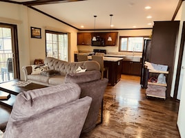 Paradise House | Living area | 75-inch Smart TV with digital channels, Netflix, first-run movies