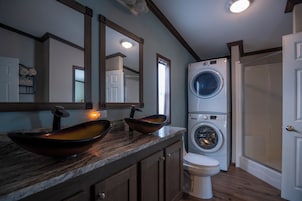 Paradise House | Bathroom | Hair dryer, bathrobes, towels, soap