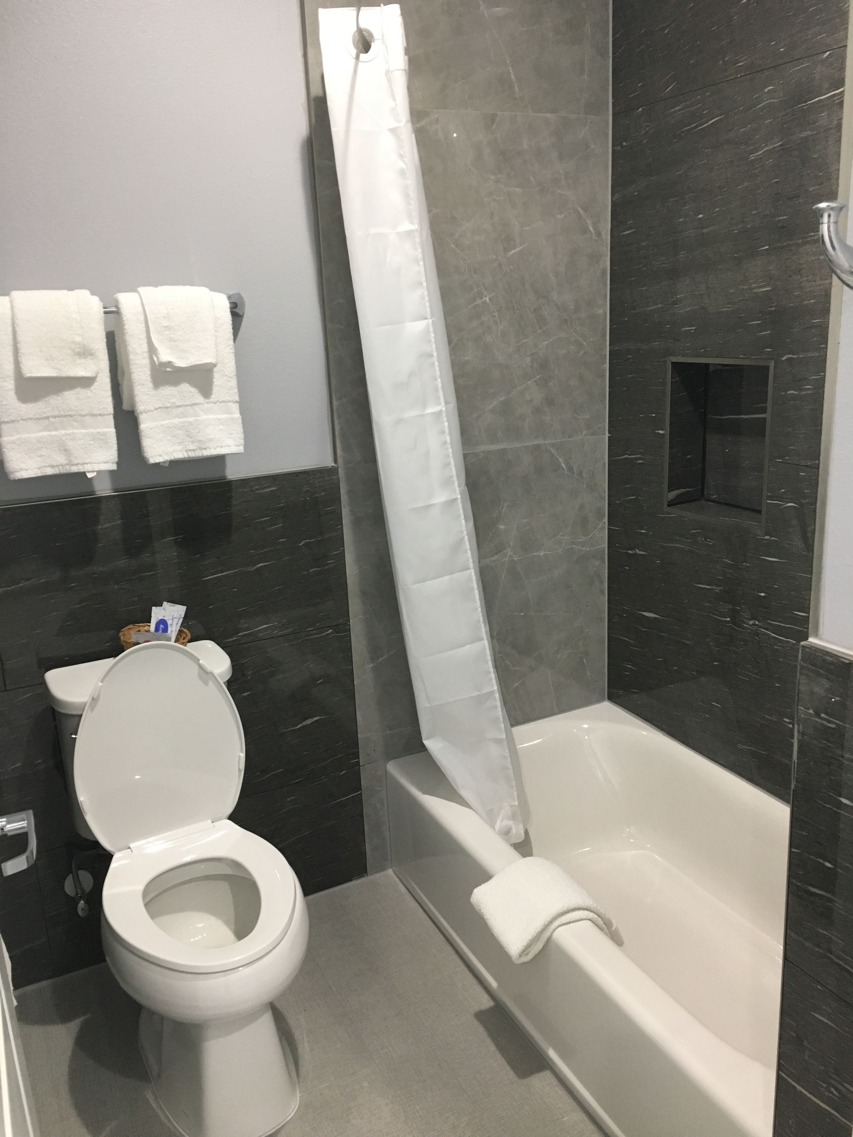 combined shower/bathtub, deep-soaking bathtub, rainfall showerhead