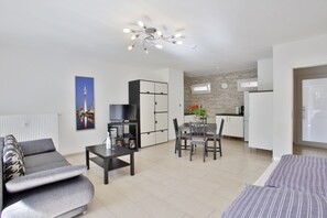 Studio | Living area | 40-inch LED TV with cable channels, TV, DVD player