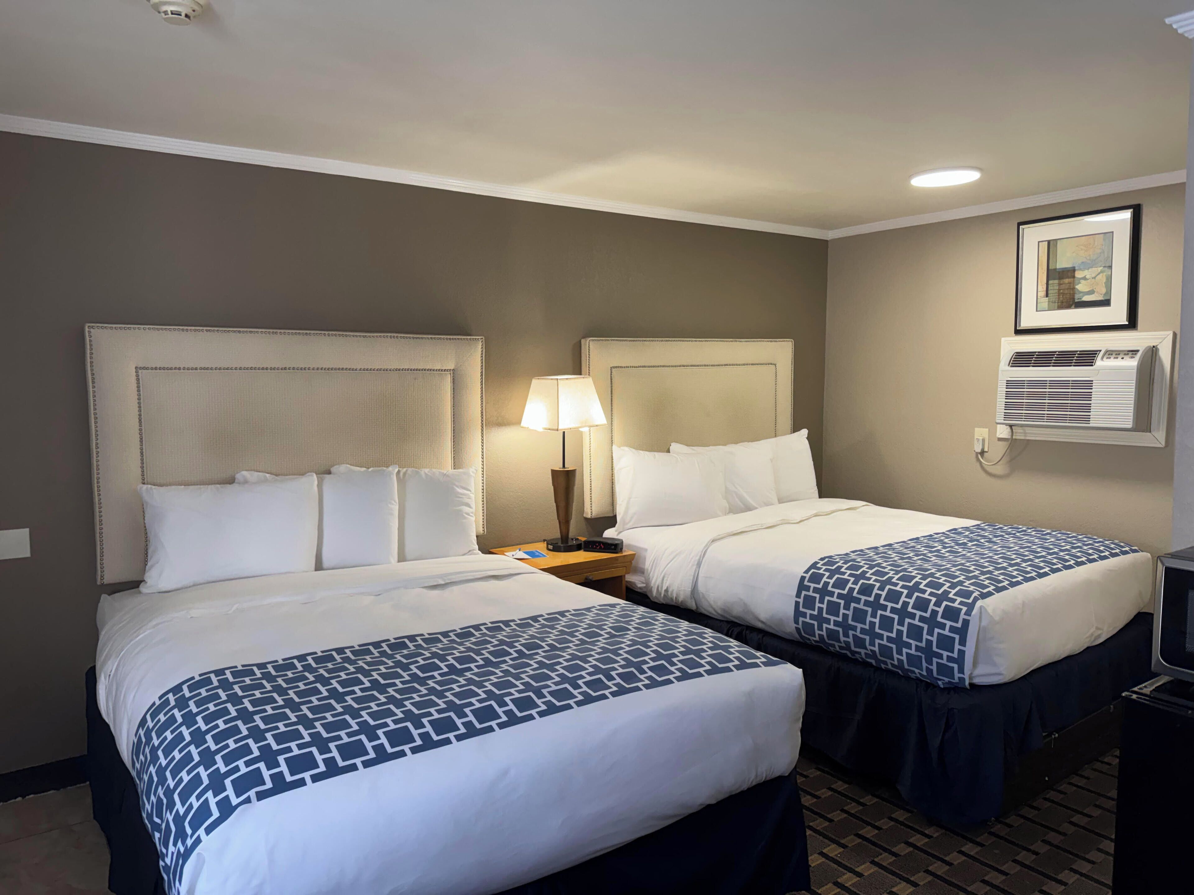 Standard Room, 2 Queen Beds, Non Smoking | Minibar, iron/ironing board, free WiFi, bed sheets