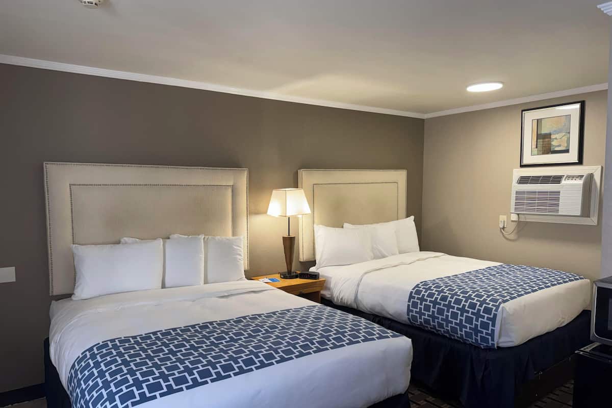 Standard Room, 2 Queen Beds, Non Smoking | Minibar, iron/ironing board, free WiFi, bed sheets