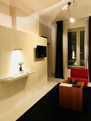 City Apartment (21) | Sala de estar | Una televisión de pantalla plana