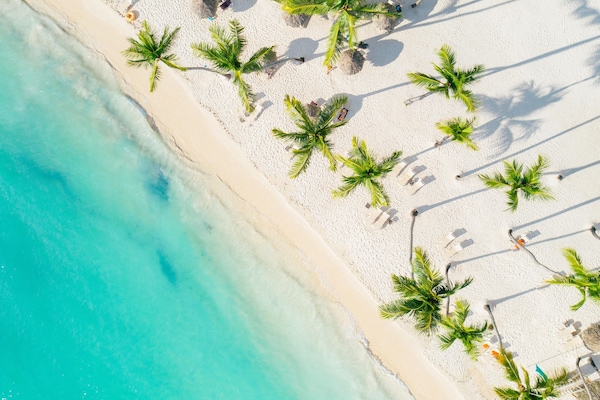 Private beach, white sand, sun loungers, beach umbrellas