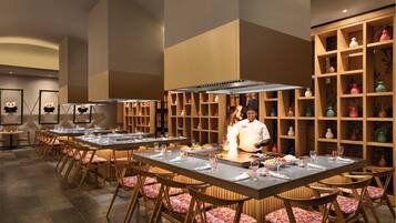 6 restaurants, breakfast, lunch, dinner served; Asian cuisine