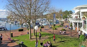 Guests can enjoy waterfront views from the balcony of this building overlooking the marina.