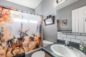 Bathtub, hair dryer, towels