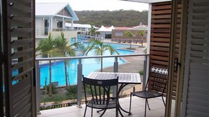 Outdoor dining - Oaks Pacific Blue, 349/265 Sandy Point Road - fantastic pool (Salamander Bay)