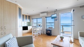 Living area - Blue Vista,9,13 Victoria Parade - Studio with stunning water views and air conditioning (Nelson Bay)