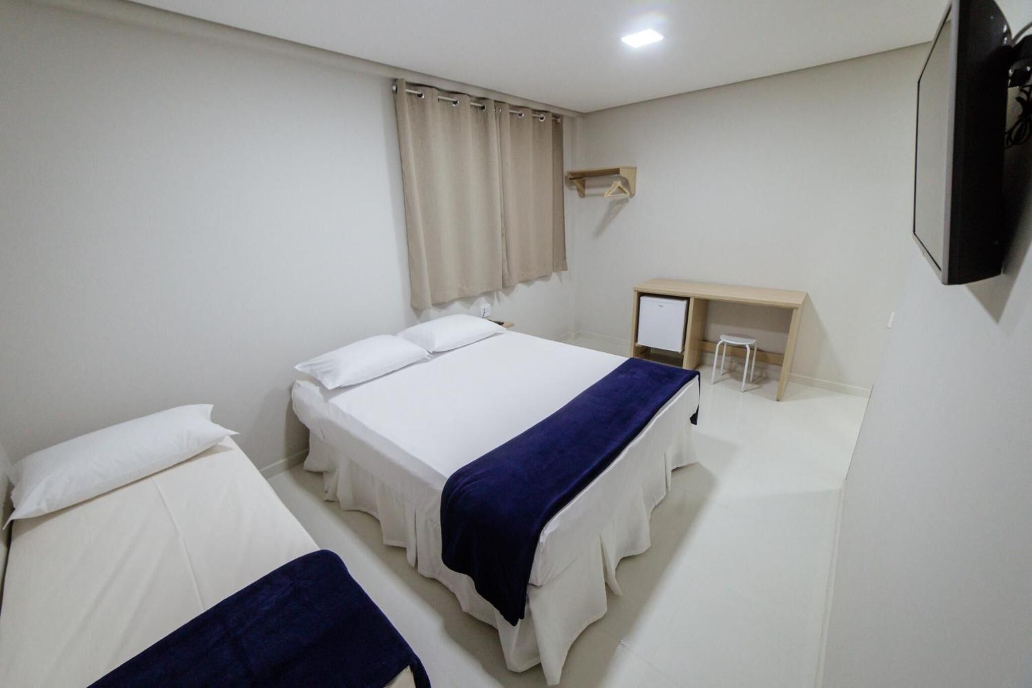 Frigobar, escrivaninha, quartos à prova de som, Wi-Fi de cortesia