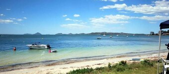 Harbourside, 5/3-7 Soldiers Point Road - ground floor waterfront unit