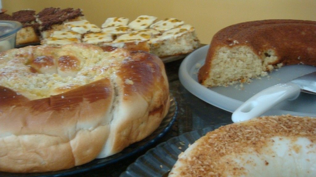 A variety of cakes on a tray.