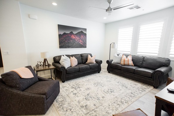 Large living space with plenty of seating — perfect for family movie nights and games, or just relaxing after an adventure filled day in St. George, Utah!