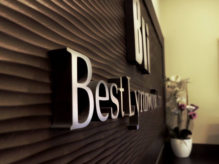 A wall with the words "Bestly" and "Bestlywood" in large, bold letters.