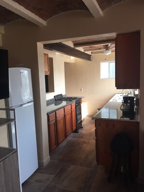 Classic Apartment, 1 Bedroom, Non Smoking, Mountain View | Private kitchen | Fridge, coffee/tea maker, cookware/dishes/utensils - Devela Accommodations (Guanajuato)