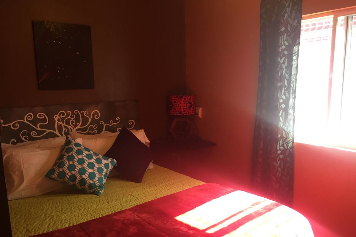 Signature Apartment, 2 Bedrooms, Non Smoking, Patio | Iron/ironing board, WiFi (free), individually decorated