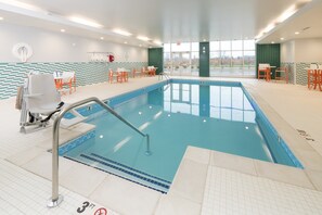 Indoor pool, open 7:00 AM to 11:00 PM, pool loungers