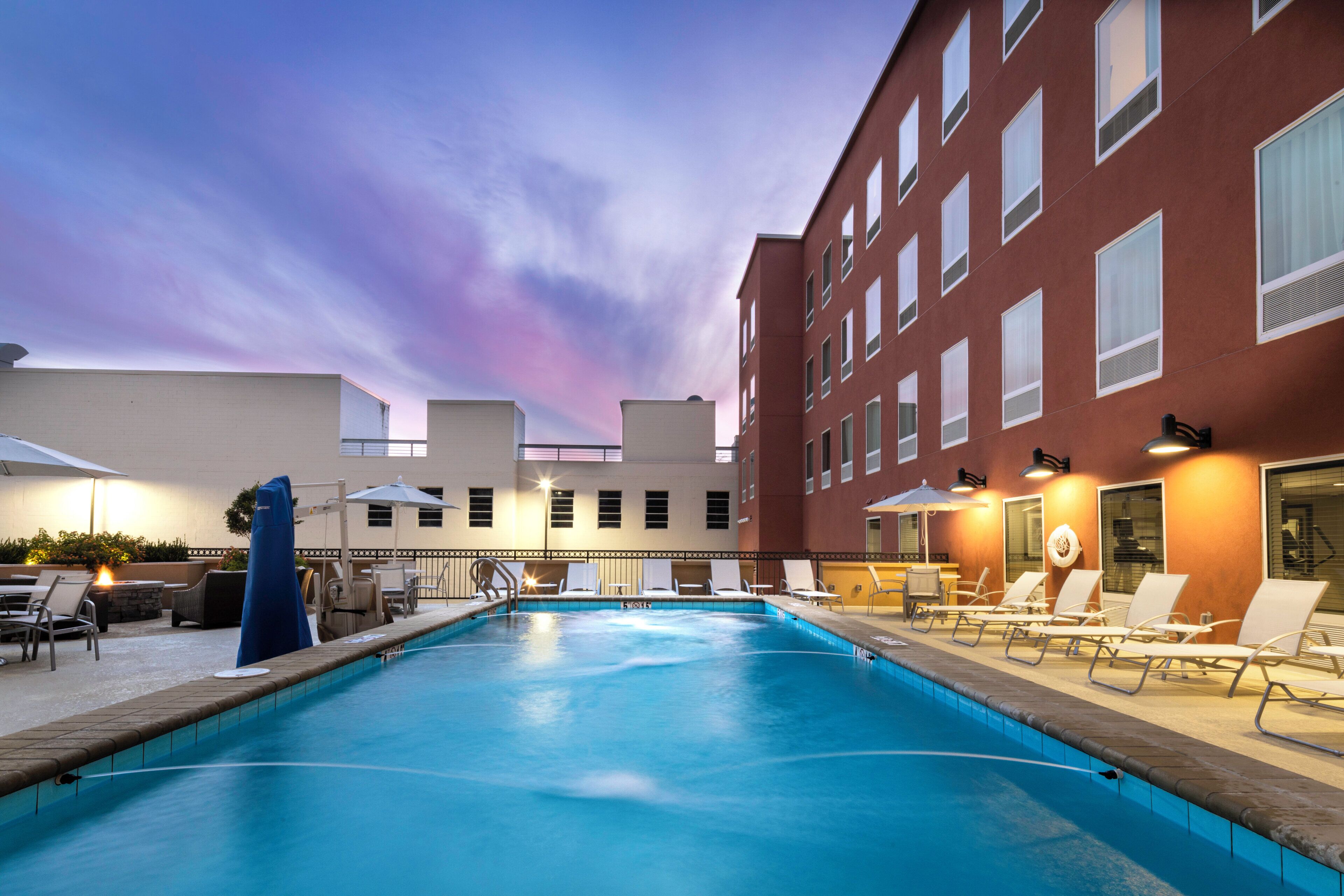Outdoor pool, open 8:00 AM to 10:00 PM, pool umbrellas, pool loungers