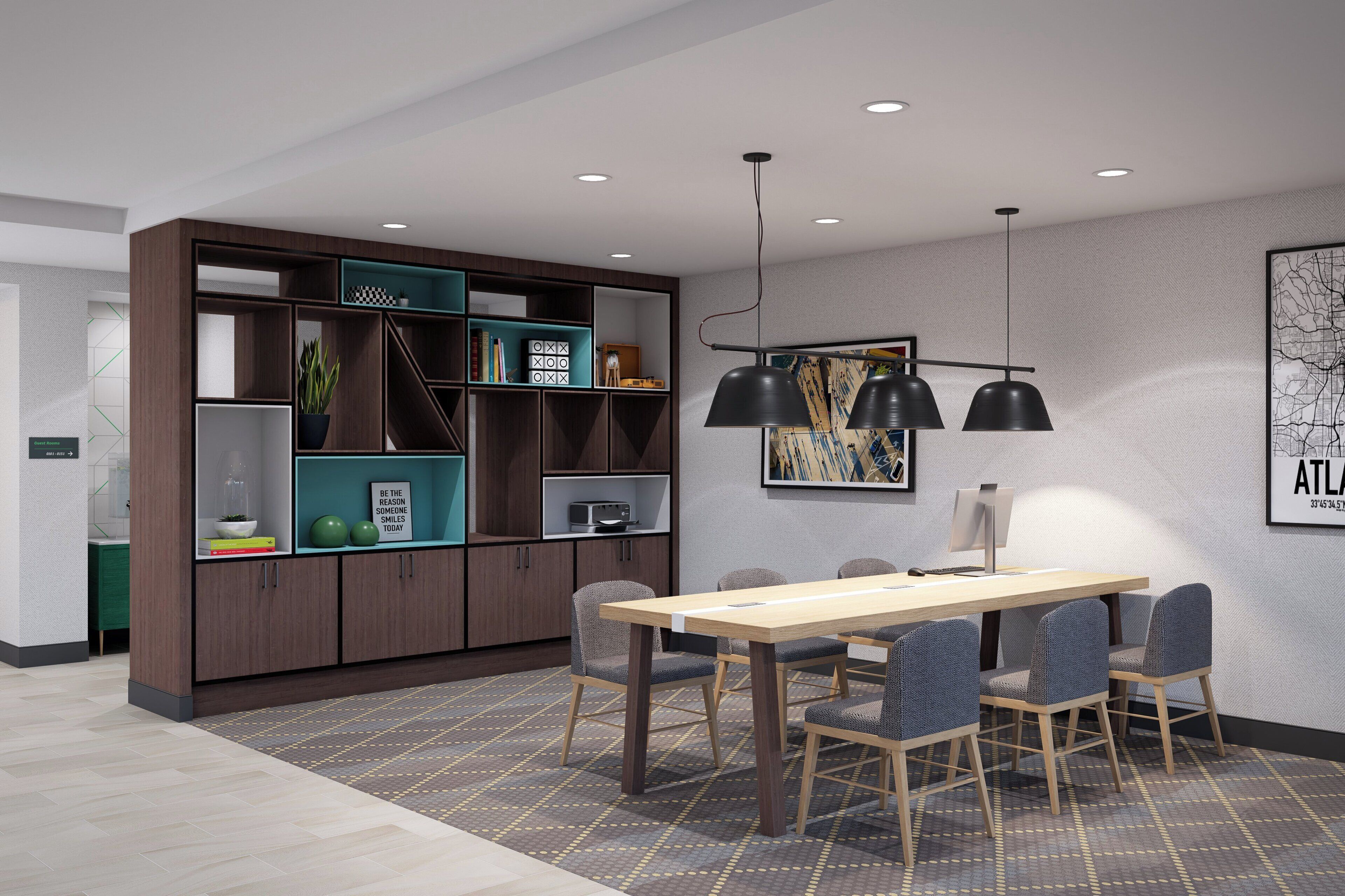 Een moderne hotelkamer met een zithoek, een grote boekenkast en een stadsgezicht op de muur.