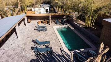 Outdoor pool, pool umbrellas, pool loungers