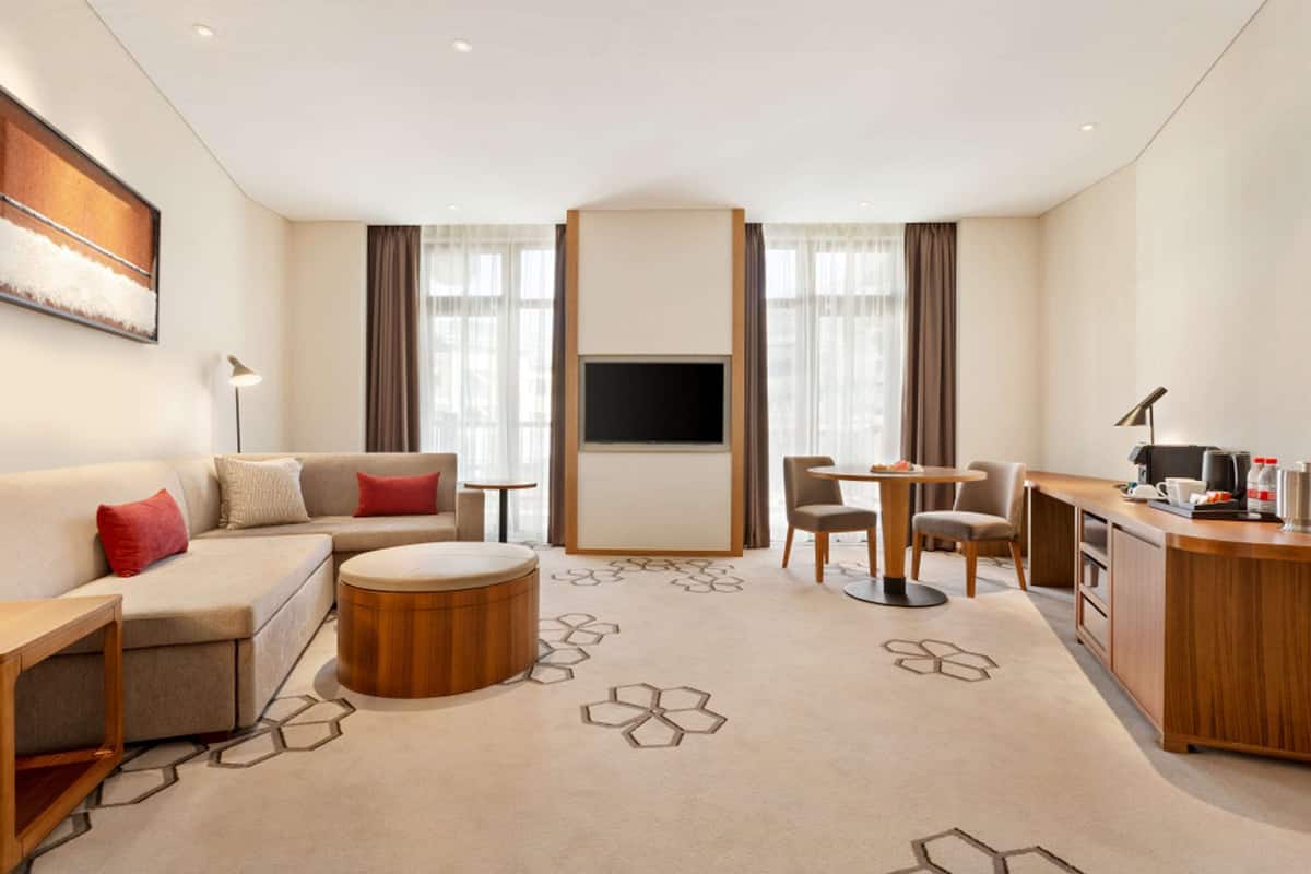 Suite, 1 King Bed with Sofa bed | 1 bedroom, minibar, in-room safe, desk