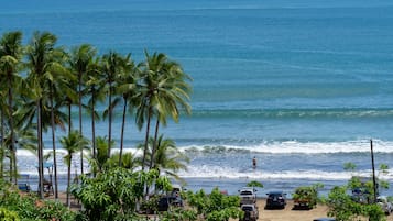 On the beach, black sand