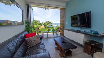 Luxury Condo, 2 Bedrooms, Ocean View (In Gated Community, 2 BDRM, 2 BTHRM) | Living area | Flat-screen TV