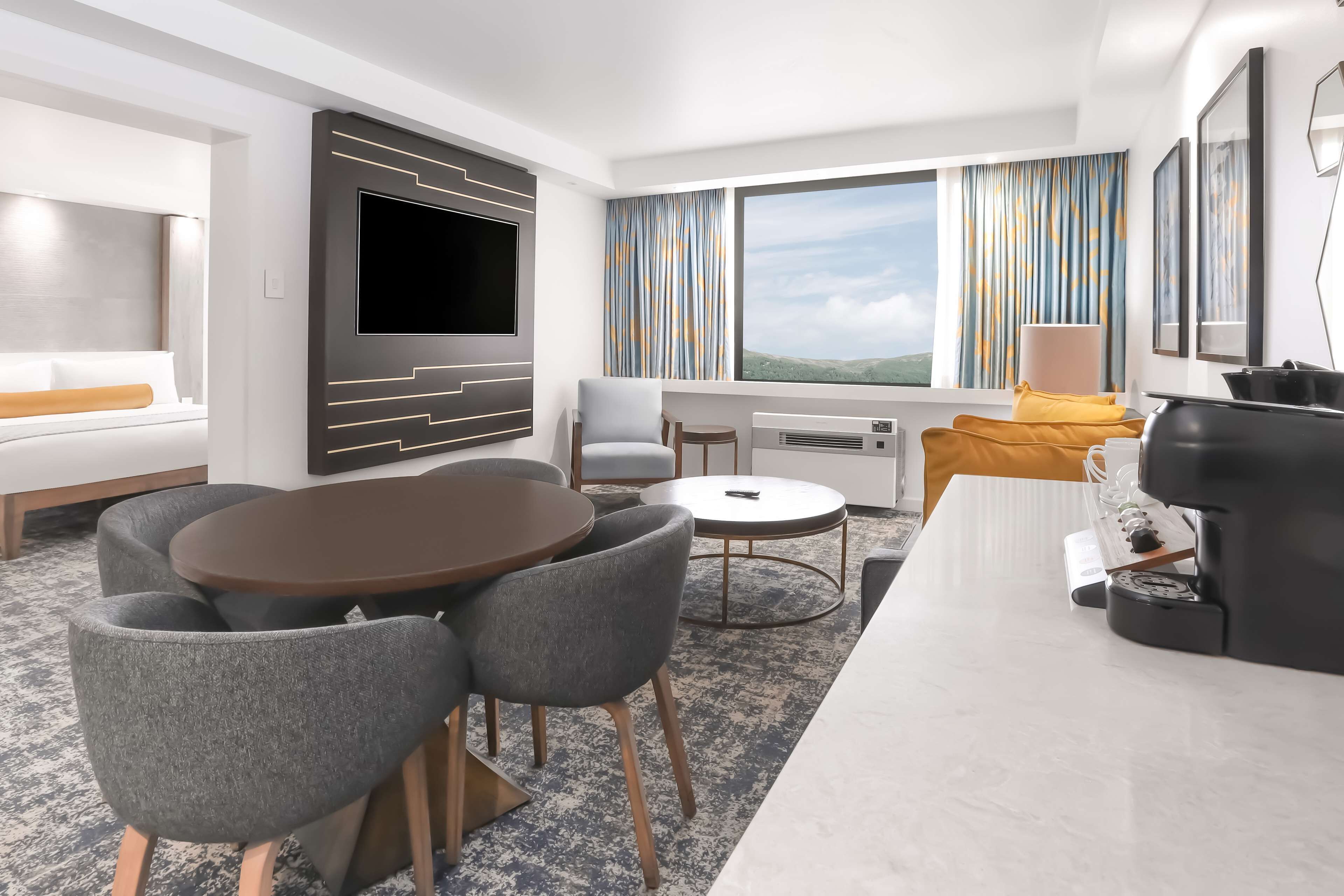 Suite | In-room safe, desk, laptop workspace, iron/ironing board