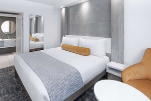 Suite | In-room safe, desk, laptop workspace, iron/ironing board