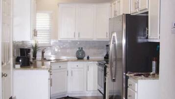Standard Room | Private kitchen | Fridge, microwave, coffee/tea maker
