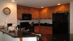 Standard Room | Private kitchen | Fridge, microwave, coffee/tea maker