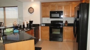 Standard Room | Private kitchen | Coffee/tea maker, fridge, microwave - Southeast Corner Offering Great Ocean Views  705 Sanibel - 3 BR 3 BA (Daytona Beach Shores)