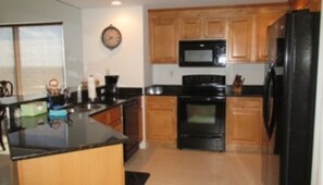 Standard Room | Private kitchen | Fridge, microwave, coffee/tea maker - Southeast Corner Offering Great Ocean Views 705 Sanibel - 3 BR 3 BA (Daytona Beach Shores)