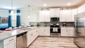 Standard Room | Private kitchen - NEW Luxury 8BR Villa Steps to Water park, South Facing Pool/Spa (Davenport)