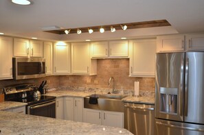 Standard Room | Private kitchen | Fridge, microwave, coffee/tea maker - 504 Seychelles - 3 Bedroom 3 Bath - Oceanfront (Daytona Beach Shores)