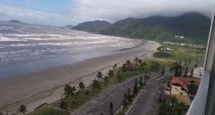 In front of the sea. City postcard
