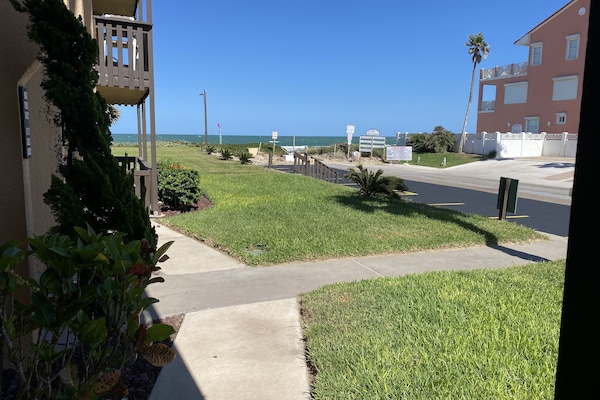 WOW! 1st Floor View to beach, and it is less than a 30 second walk to the sand.