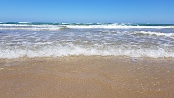 On the beach, beach towels