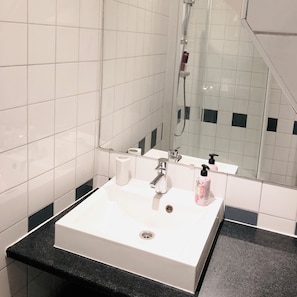 Shower, free toiletries, hair dryer, towels