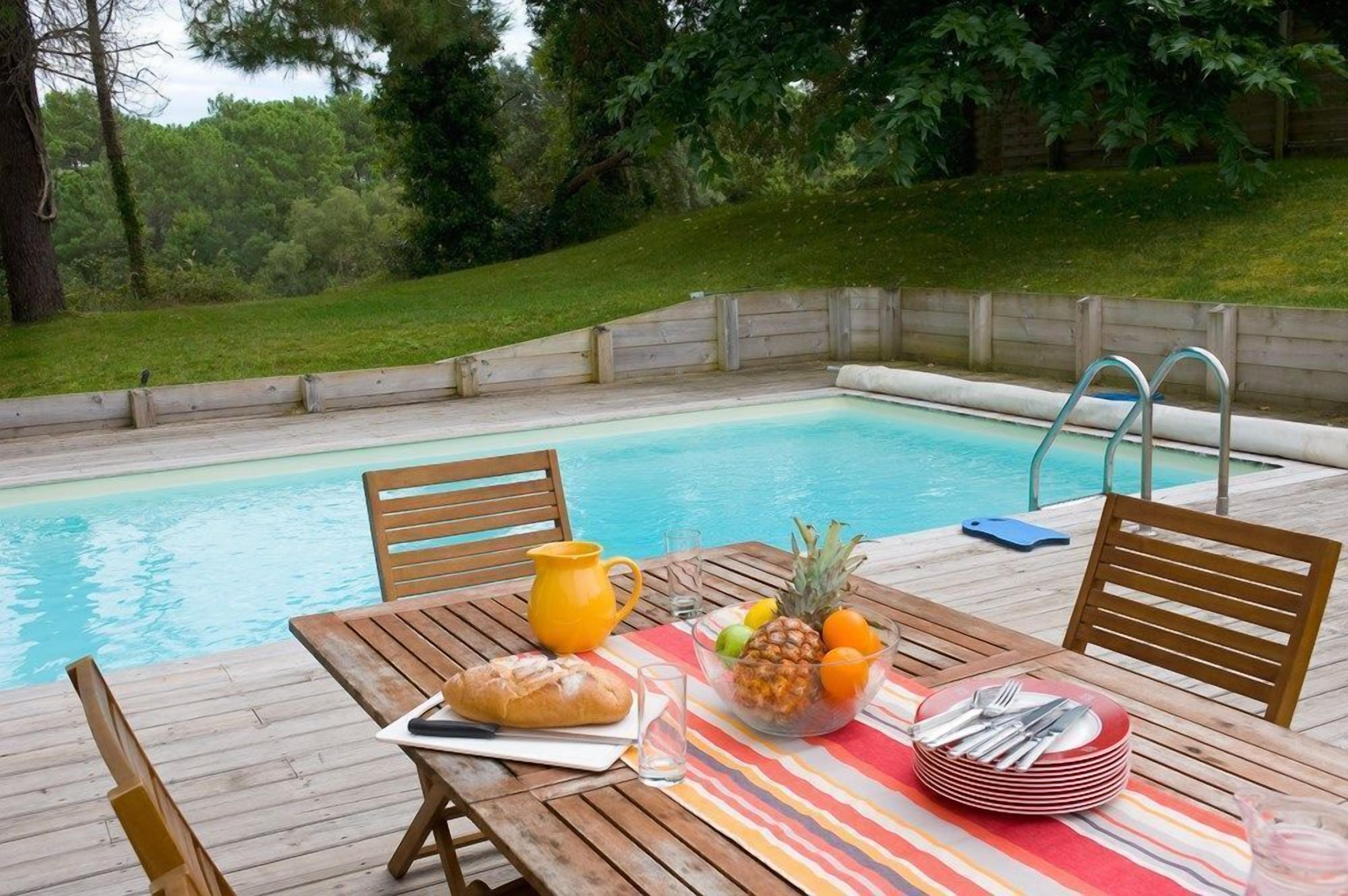 Sit out by your private pool and enjoy the sunshine.