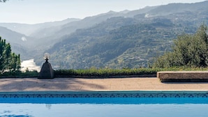 A swimming pool with a view of a mountainous landscape. - Quinta do Loureiro  Douro  Baião  Private  Pool  Stunning Views  Full privacy . (Santa Leocádia)