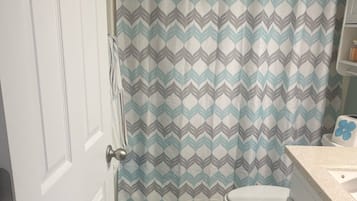 Hair dryer, towels, soap, shampoo