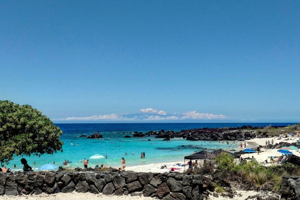 On the beach, sun-loungers, beach towels