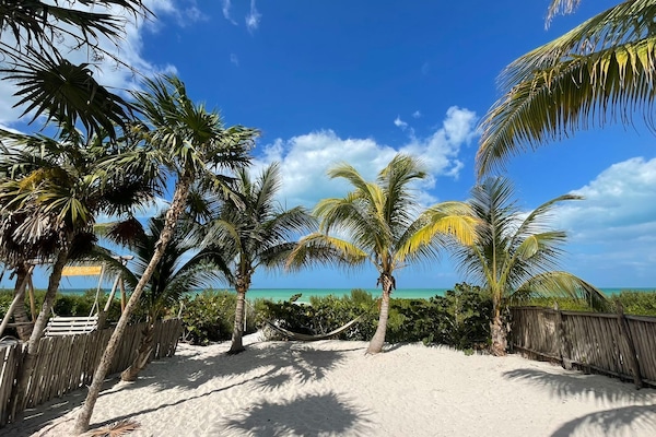 On the beach, sun-loungers, beach towels