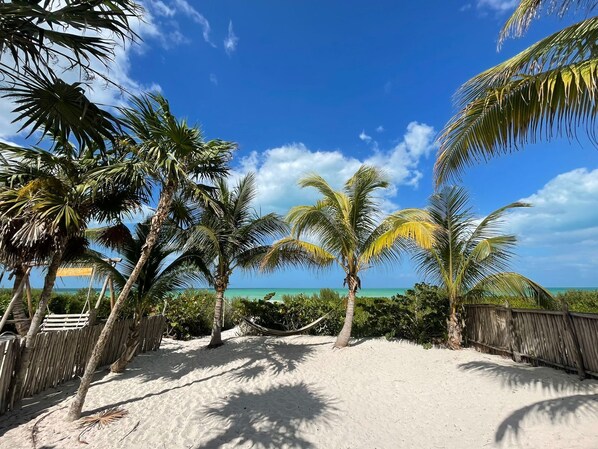 On the beach, sun-loungers, beach towels