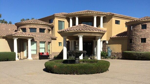 A large, two-story house with a central courtyard, columns, and a fountain. - Biltmore Golf and Resort (just steps away from the fabulous Biltmore Hotel) (Phoenix)